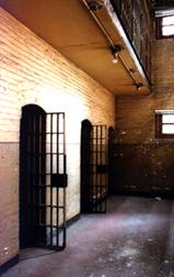 [A district prison's ground floor cells]